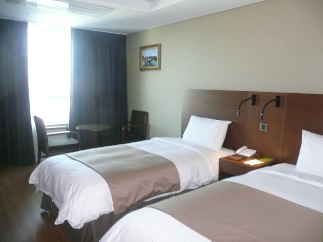 クラウンハーバーホテル釜山の部屋のベッド